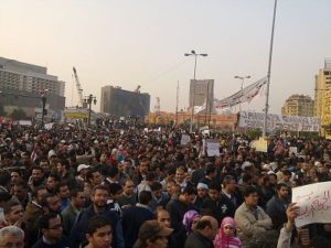 800px-Crowd_in_Midan_El-Tahrird_During_the_2011_Egyptian_Protests image of a protesting crowd in midan el-tahrird during the 2011 egyptian protests.
