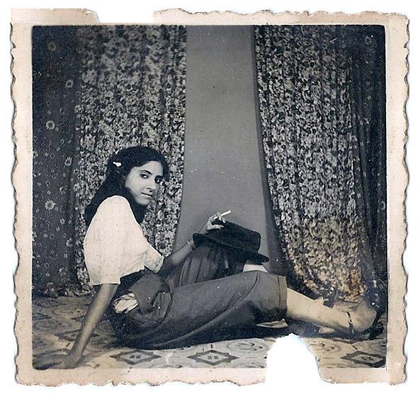 “My mother, Mohini Goklani. Pune, Maharashtra. Circa 1950” Image of a Mohini Goklani who would have herself photographed (in confidence) as ‘liberal’ . Copying Indian Film stars, they wore pants and holding a cigarette (1950). Image and Text contributed by Sunita Kripalani, Goa http://www.indianmemoryproject.com/80/