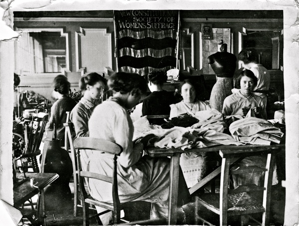 The Work Room set up in 1914 by the NCS as part of its war effort. This is the only image extant of the NCS banner.